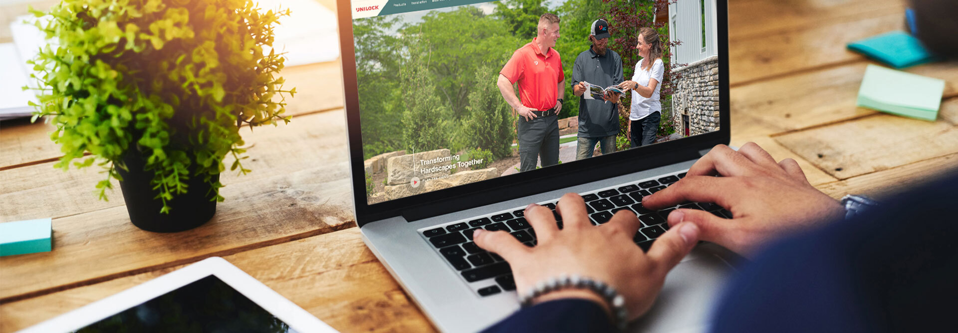 unilock contractor website on laptop